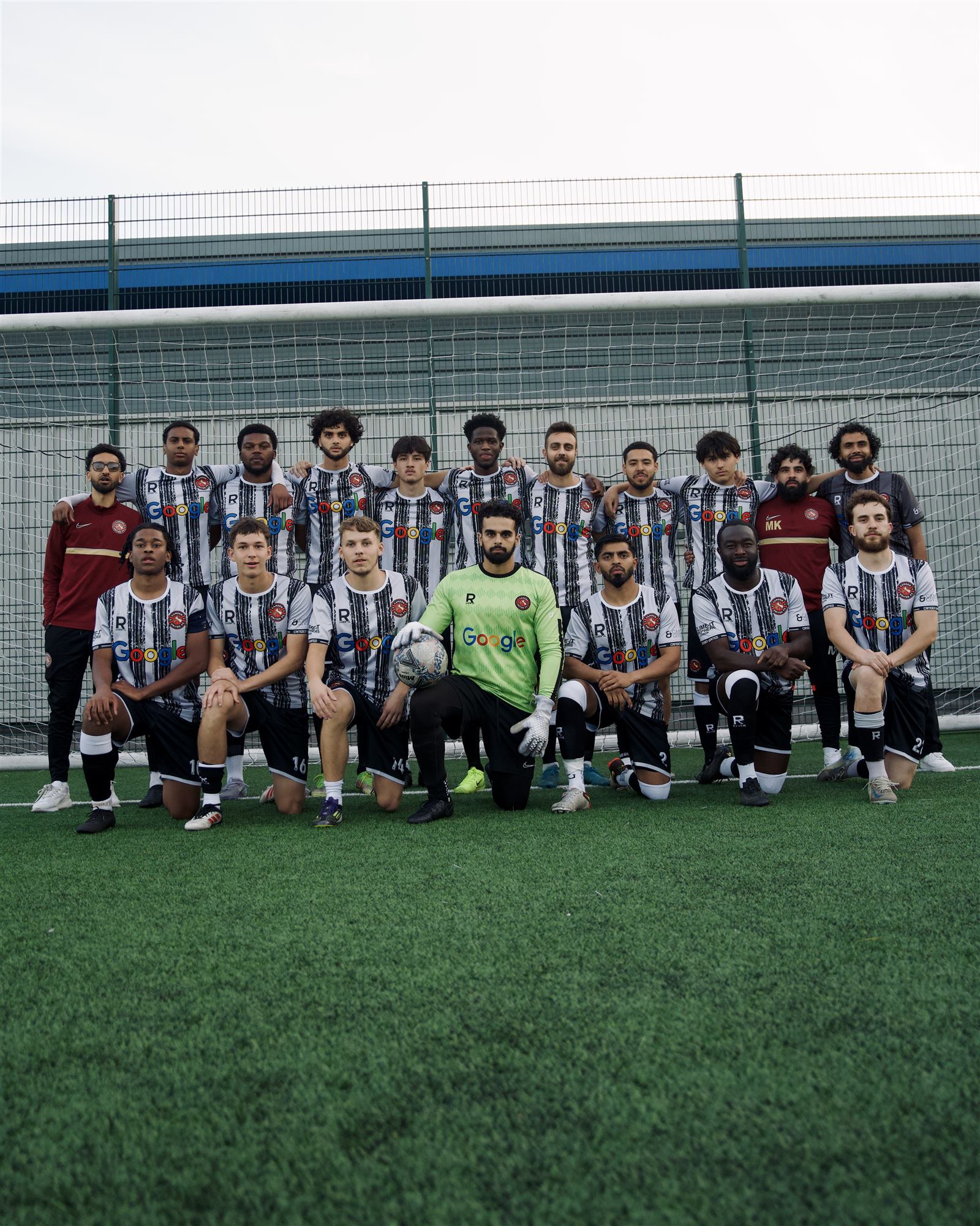 Camden United midweek teams group photo on the pitch